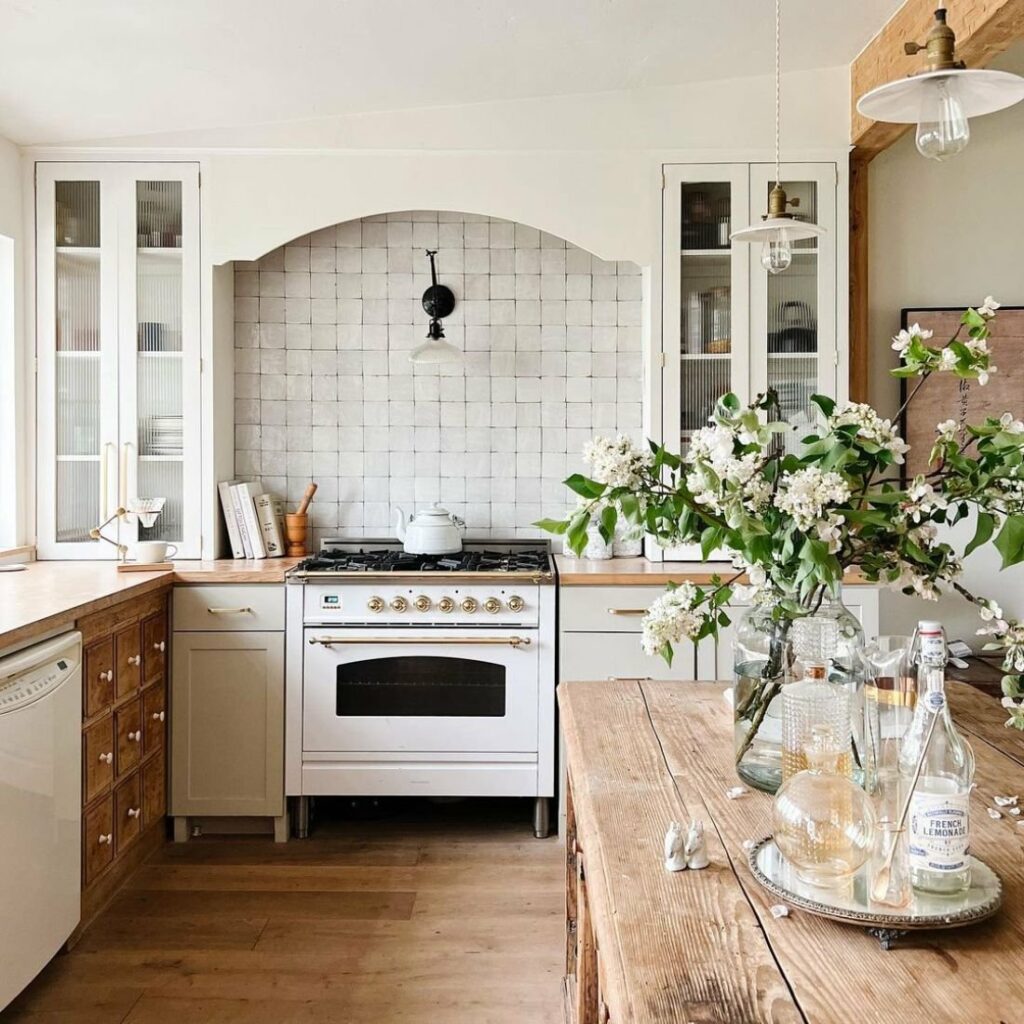 Arch Window Over Stove Adds Design Interest to Kitchen